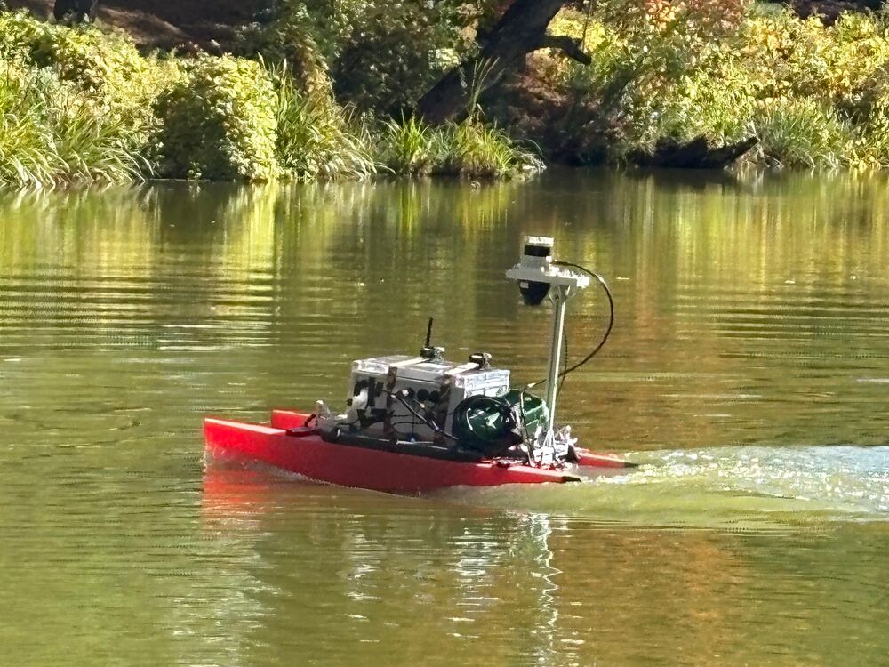 Instrumented surface vehicle moving across the water